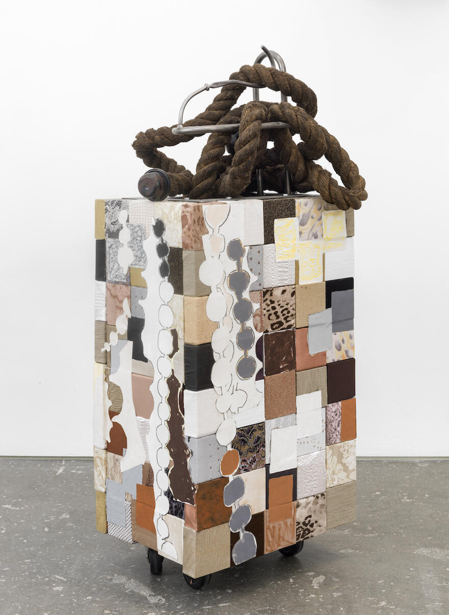 Box-form sculpture with rope assemblage on top
